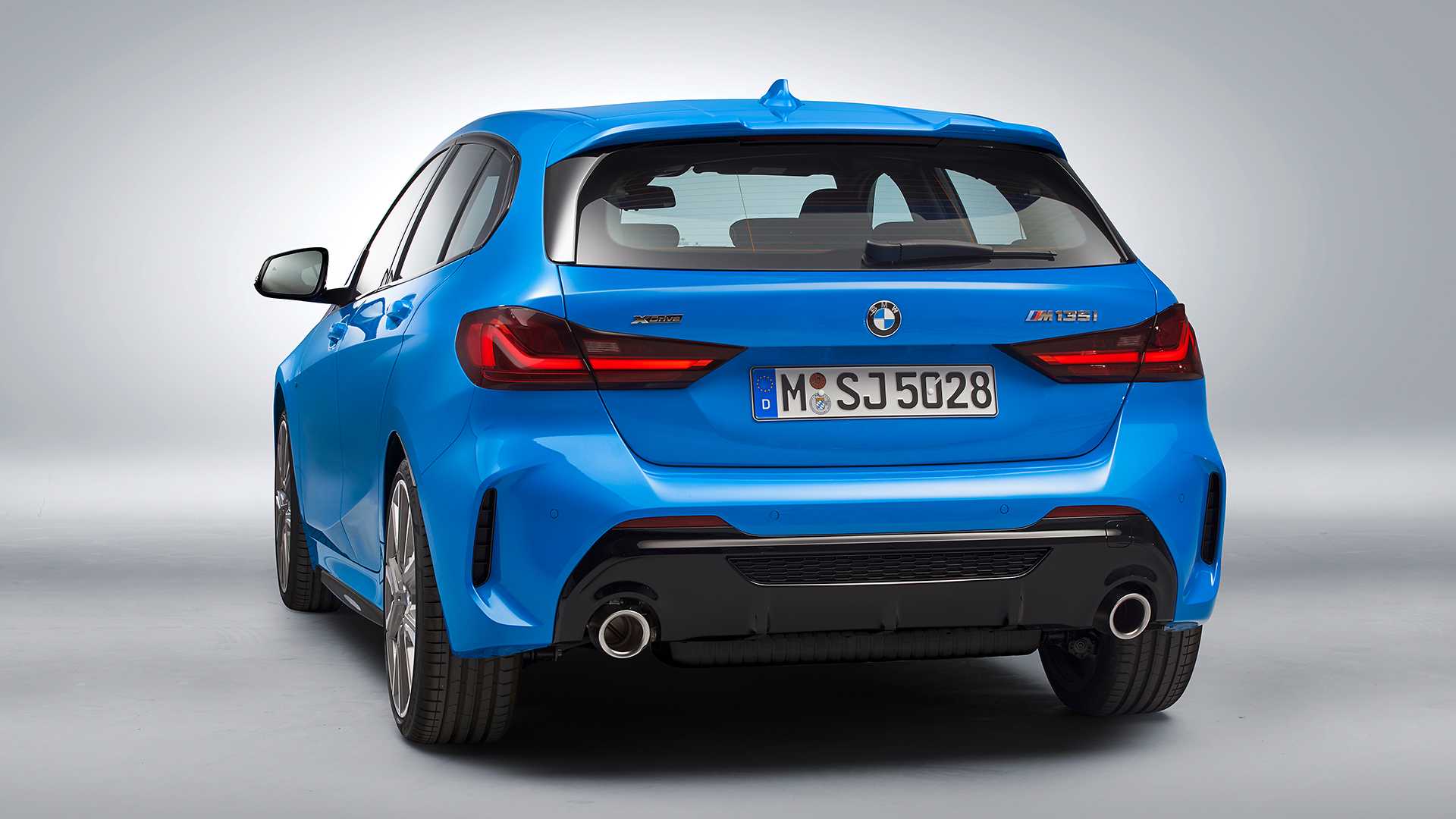 2020 BMW M135i xDrive (Color: Misano Blue Metallic) Rear Three-Quarter Wallpapers #22 of 55