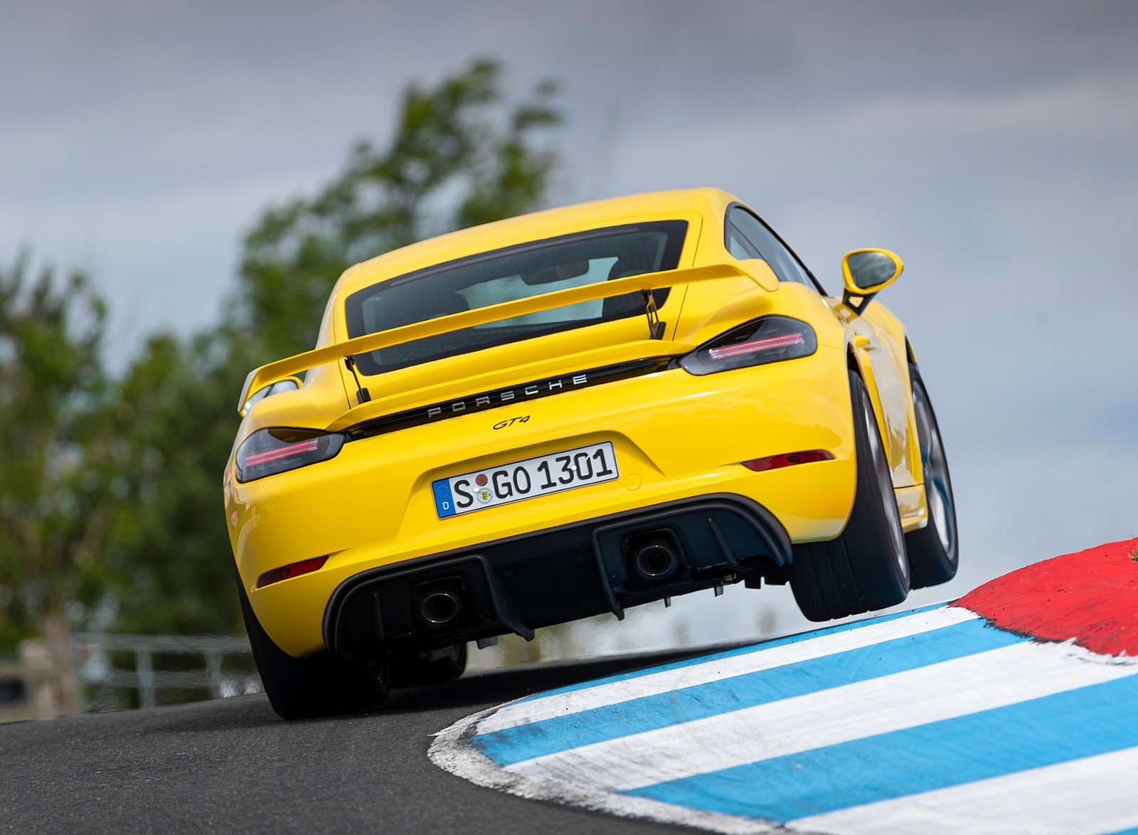 2020 Porsche 718 Cayman GT4 (Color: Racing Yellow) Rear Wallpapers #70 of 177