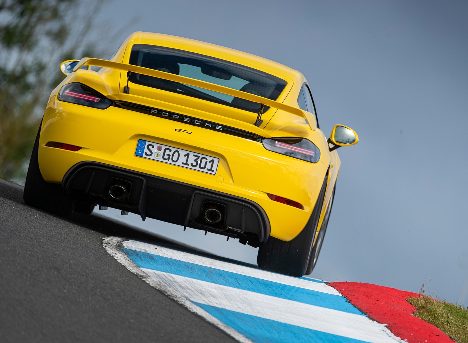 2020 Porsche 718 Cayman GT4 (Color: Racing Yellow) Rear Wallpapers #72 of 177