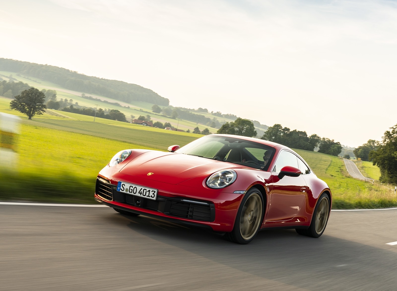 2020 Porsche 911 Carrera Coupe (Color: Guards Red) Front Three-Quarter Wallpapers (1)