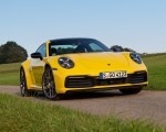 2020 Porsche 911 Carrera Coupe (Color: Racing Yellow) Front Three-Quarter Wallpapers 150x120