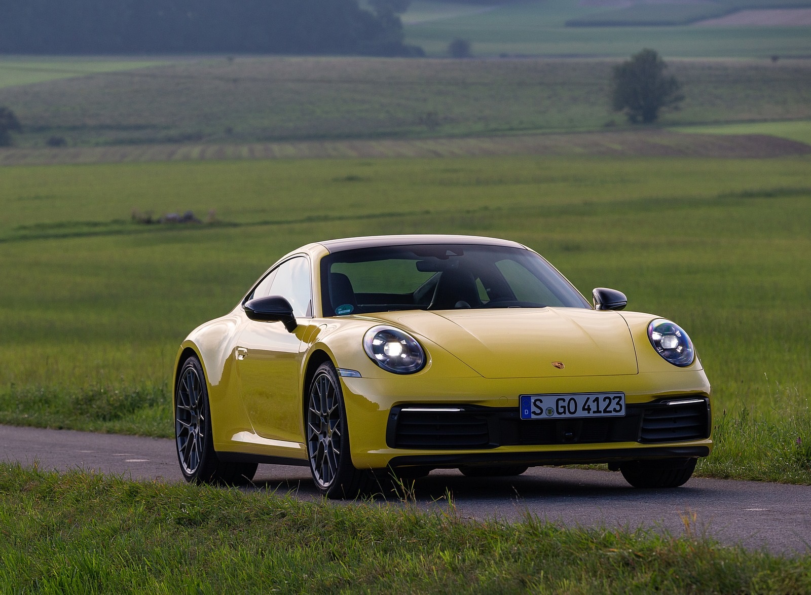 2020 Porsche 911 Carrera Coupe (Color: Racing Yellow) Front Three-Quarter Wallpapers #86 of 126