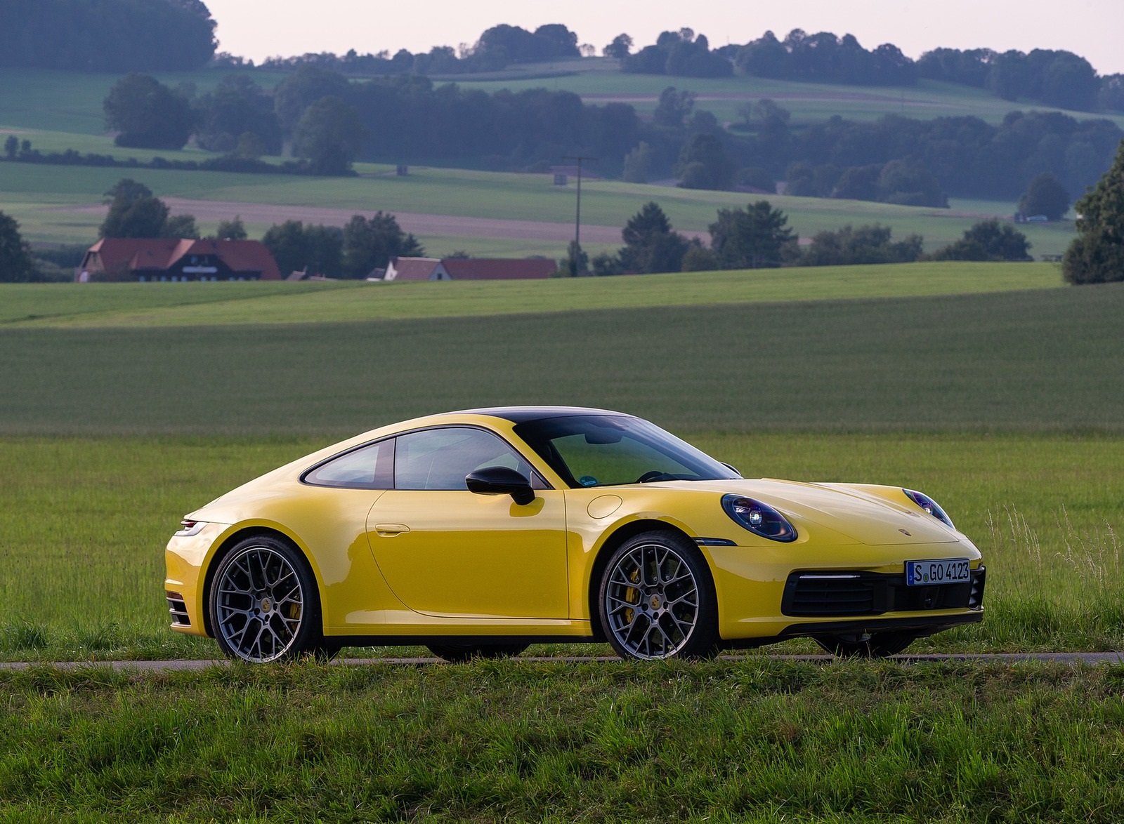 2020 Porsche 911 Carrera Coupe (Color: Racing Yellow) Front Three-Quarter Wallpapers #87 of 126