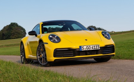 2020 Porsche 911 Carrera Coupe (Color: Racing Yellow) Front Three-Quarter Wallpapers 450x275 (91)
