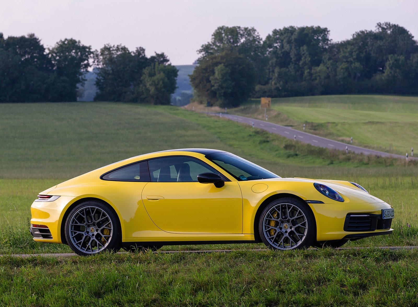 2020 Porsche 911 Carrera Coupe (Color: Racing Yellow) Front Three-Quarter Wallpapers #90 of 126