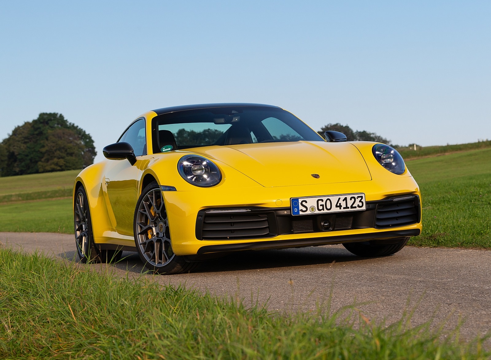 2020 Porsche 911 Carrera Coupe (Color: Racing Yellow) Front Three-Quarter Wallpapers #91 of 126