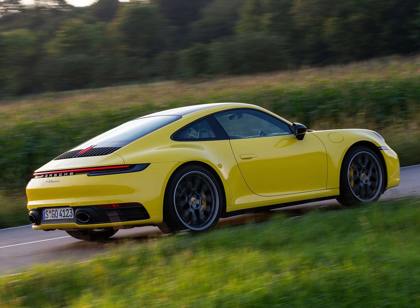 2020 Porsche 911 Carrera Coupe (Color: Racing Yellow) Rear Three-Quarter Wallpapers #94 of 126