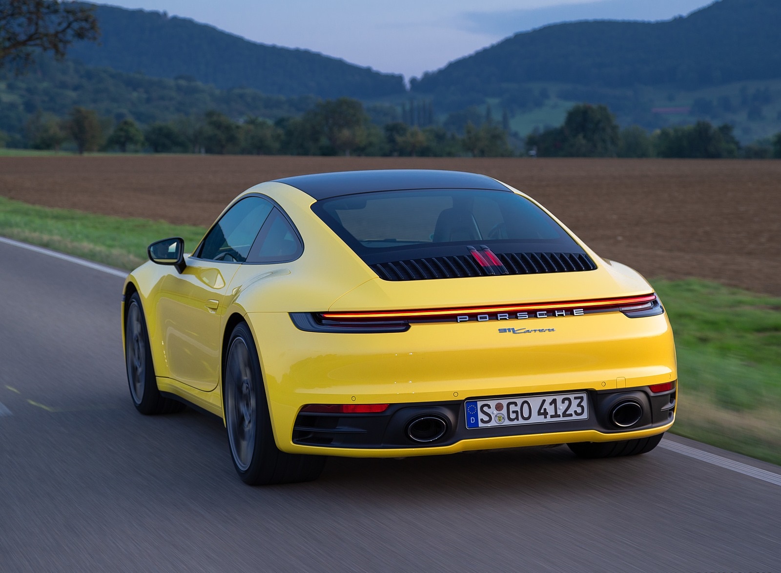 2020 Porsche 911 Carrera Coupe (Color: Racing Yellow) Rear Three-Quarter Wallpapers #81 of 126