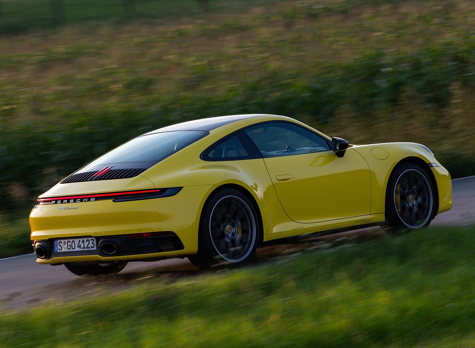 2020 Porsche 911 Carrera Coupe (Color: Racing Yellow) Rear Three-Quarter Wallpapers #95 of 126