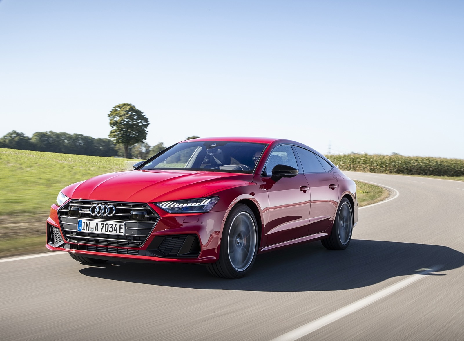 2020 Audi A7 Sportback 55 TFSI e quattro Plug-In Hybrid (Color: Tango Red) Front Three-Quarter Wallpapers (2)