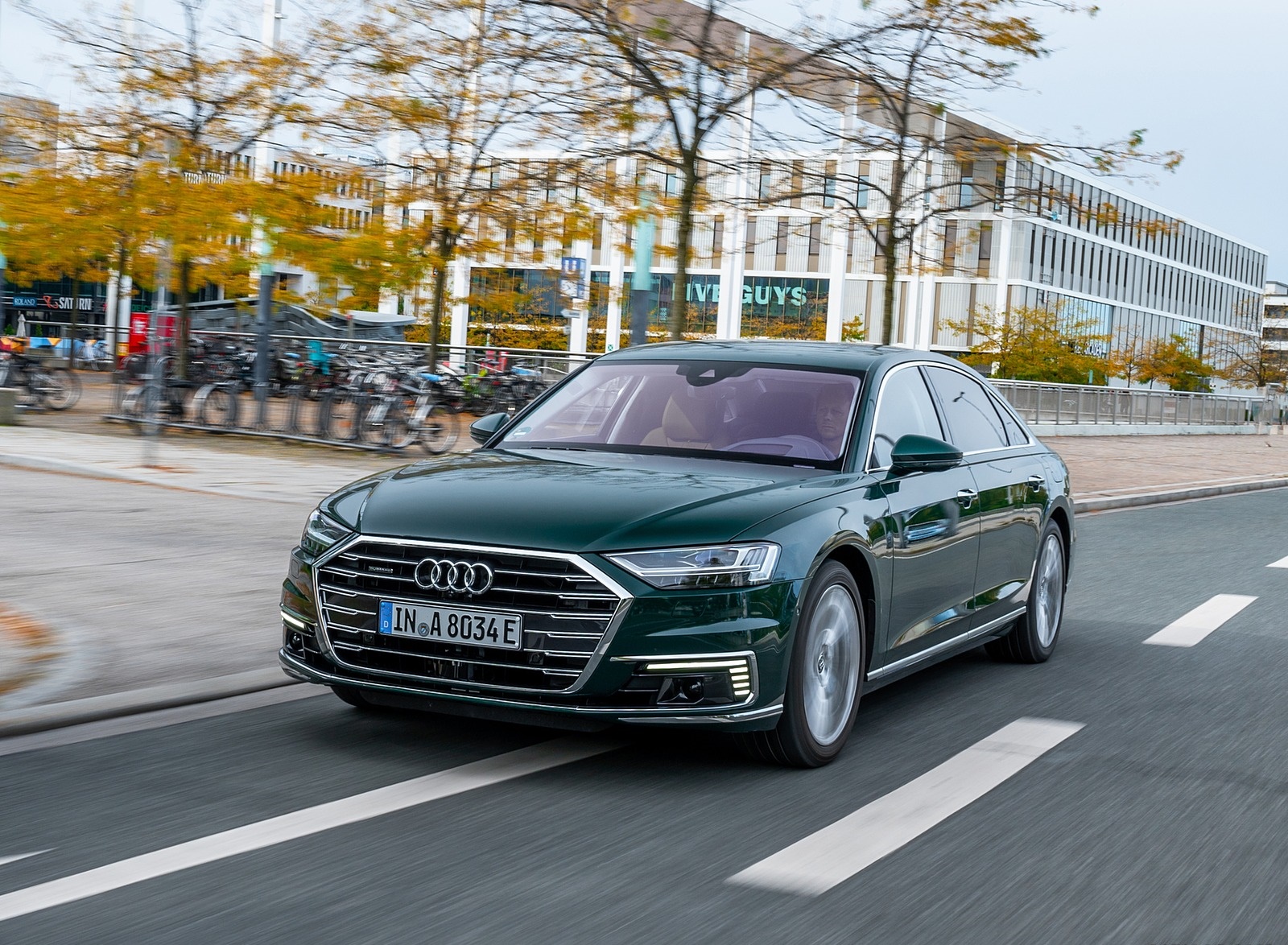 2020 Audi A8 L 60 TFSI e quattro Plug-In Hybrid (Color: Goodwood Green) Front Three-Quarter Wallpapers #25 of 49
