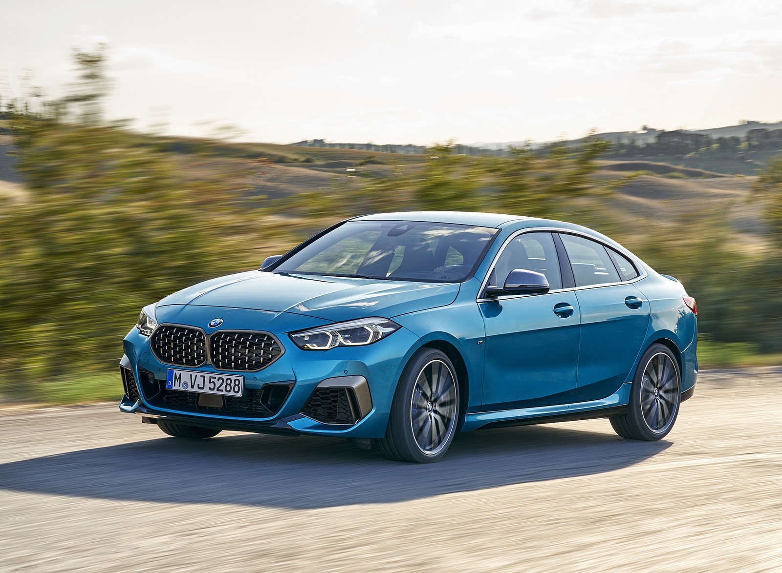 2020 BMW M235i Gran Coupe xDrive (Color: Snapper Rocks Blue Metallic) Front Three-Quarter Wallpapers #4 of 48