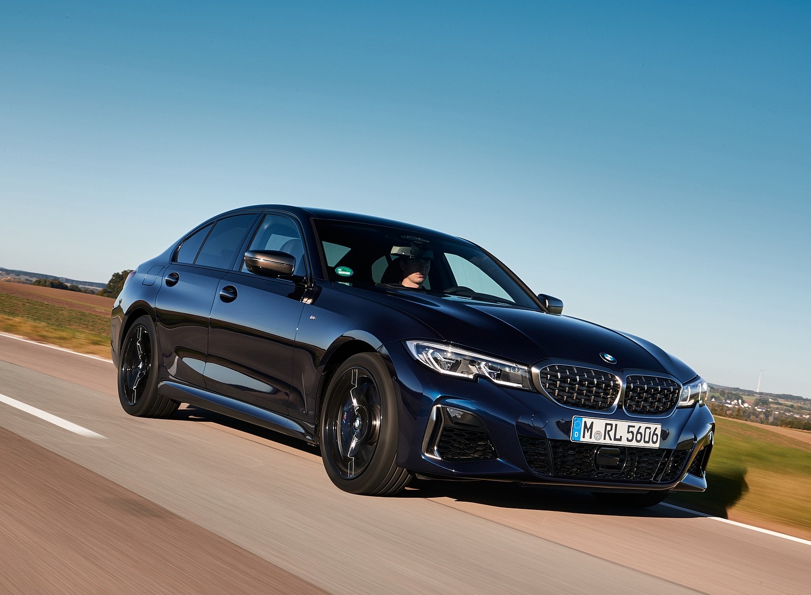2020 BMW M340i Sedan (Color: Tanzanite Blue Metallic) Front Three-Quarter Wallpapers (1). Download Wallpaper