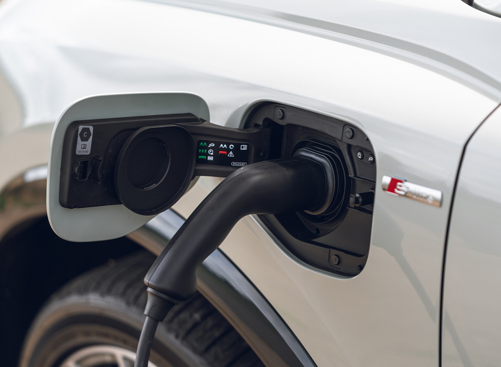 2021 Audi Q3 Sportback 45 TFSI e Plug-In Hybrid (Color: Dew Silver; UK-Spec) Charging Connector Wallpapers #72 of 112