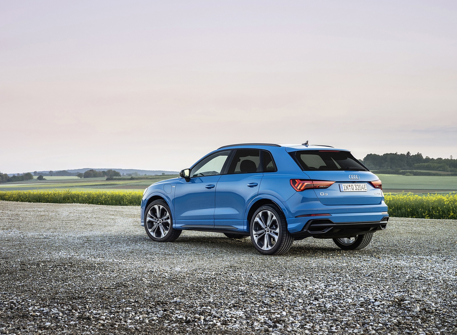 2021 Audi Q3 TFSI e Plug-In Hybrid (Color: Turbo Blue) Rear Three-Quarter Wallpapers (10)