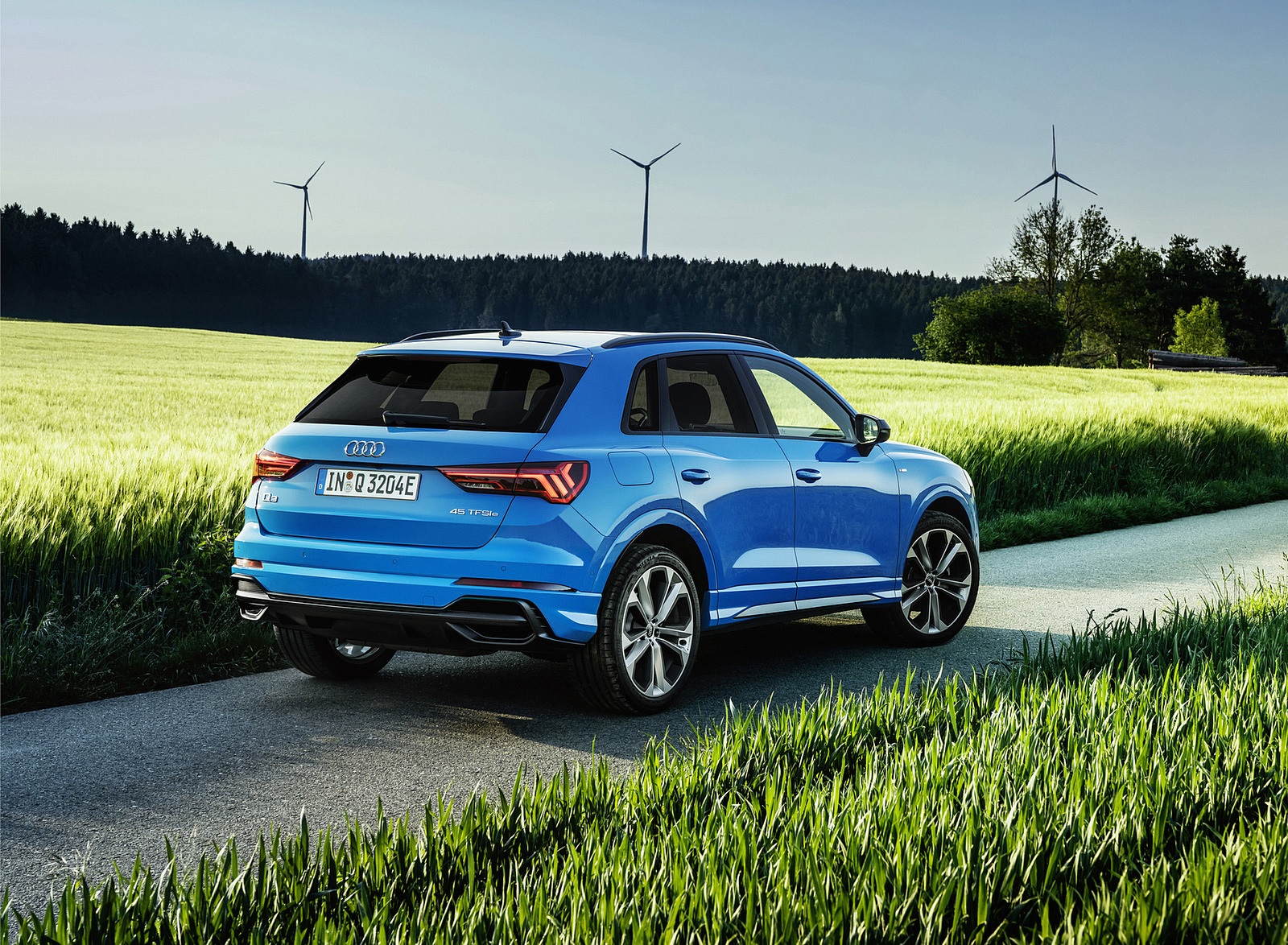 2021 Audi Q3 TFSI e Plug-In Hybrid (Color: Turbo Blue) Rear Three-Quarter Wallpapers #24 of 104