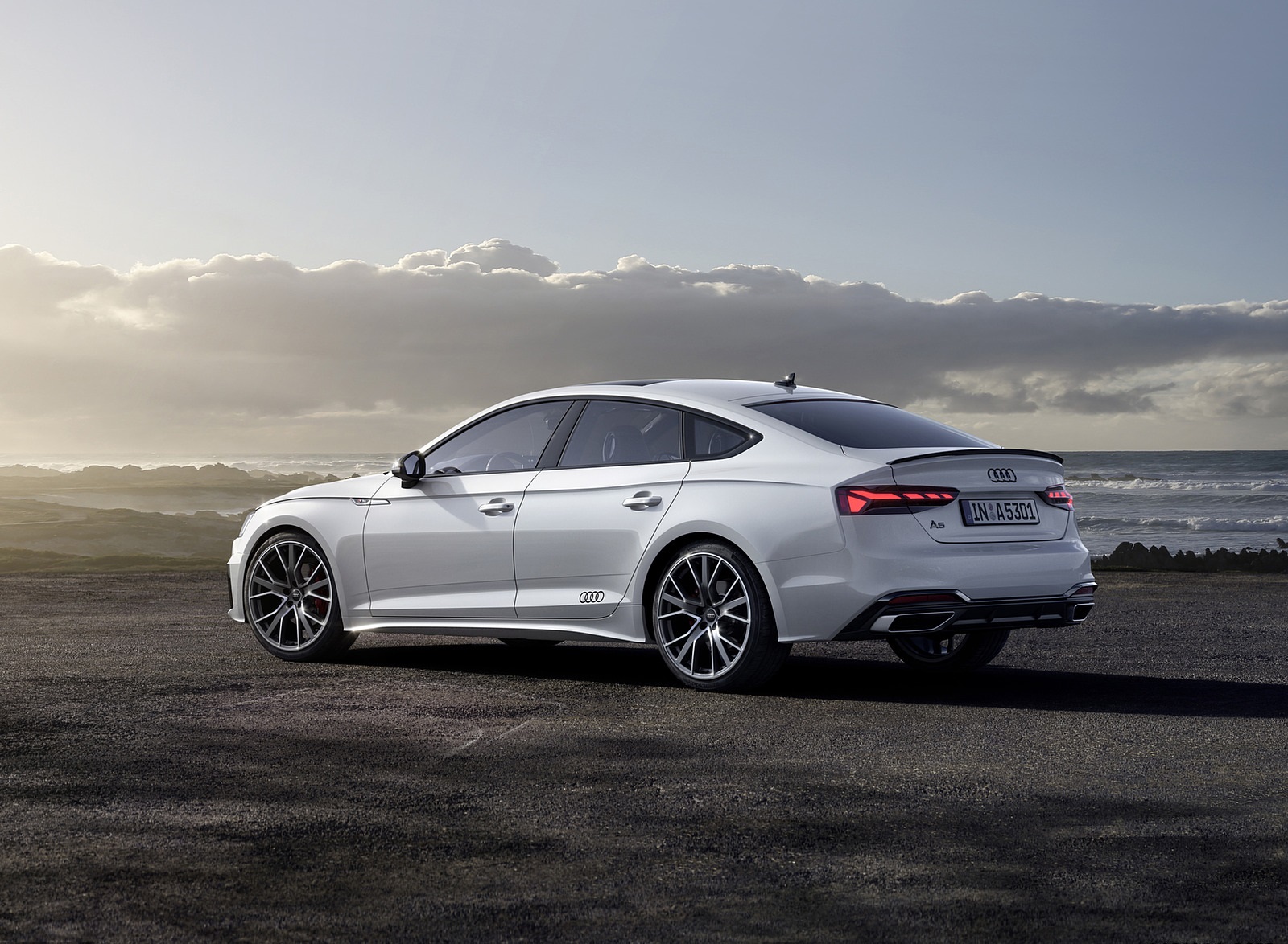 2022 Audi A5 Sportback S Line Competition Plus (Color: Glacier White Metallic) Rear Three-Quarter Wallpapers (6)