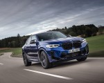 2022 BMW X4 M Competition (Color: Marina Bay Blue Metallic) Front Three-Quarter Wallpapers 150x120