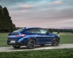 2022 BMW X4 M Competition (Color: Marina Bay Blue Metallic) Rear Three-Quarter Wallpapers 150x120