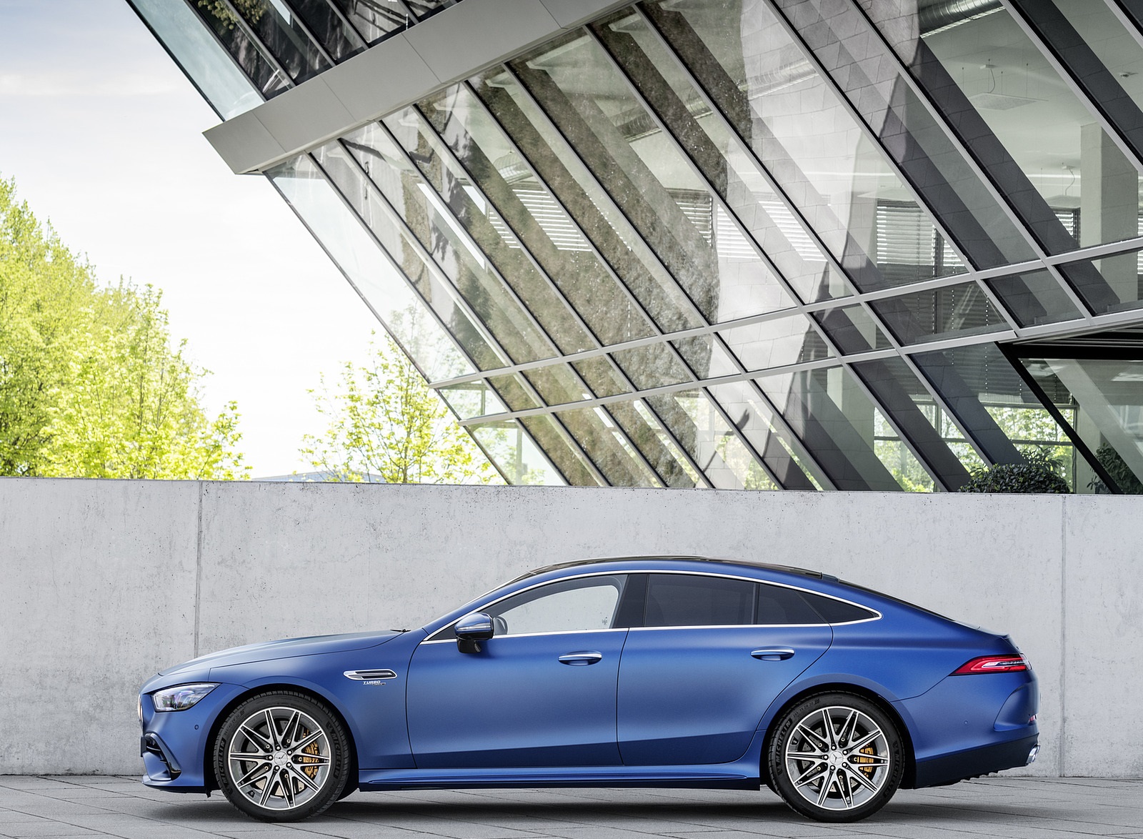2022 Mercedes-AMG GT 53 4MATIC+ 4-Door Coupe (Color: Spectrale Blue Magno) Side Wallpapers #23 of 35