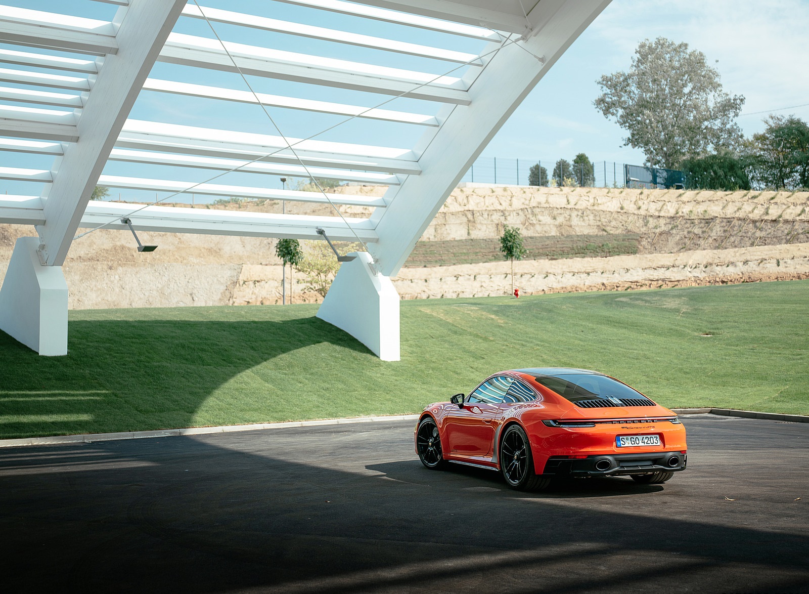 2022 Porsche 911 Carrera 4 GTS (Color: Lava Orange) Rear Three-Quarter Wallpapers #41 of 64