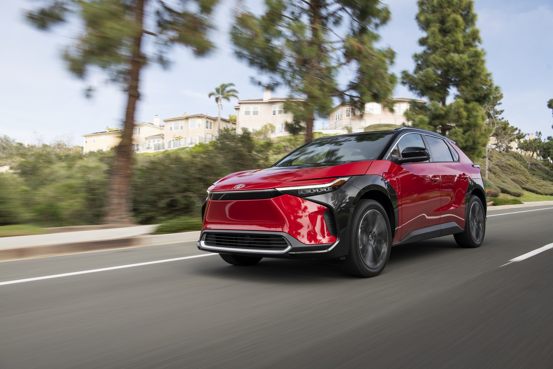 2023 Toyota bZ4X Limited AWD (Color: Supersonic Red) Front Three-Quarter Wallpapers (5)