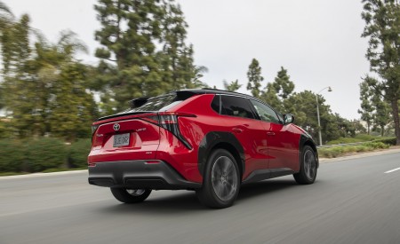 2023 Toyota bZ4X Limited AWD (Color: Supersonic Red) Rear Three-Quarter Wallpapers 450x275 (9)