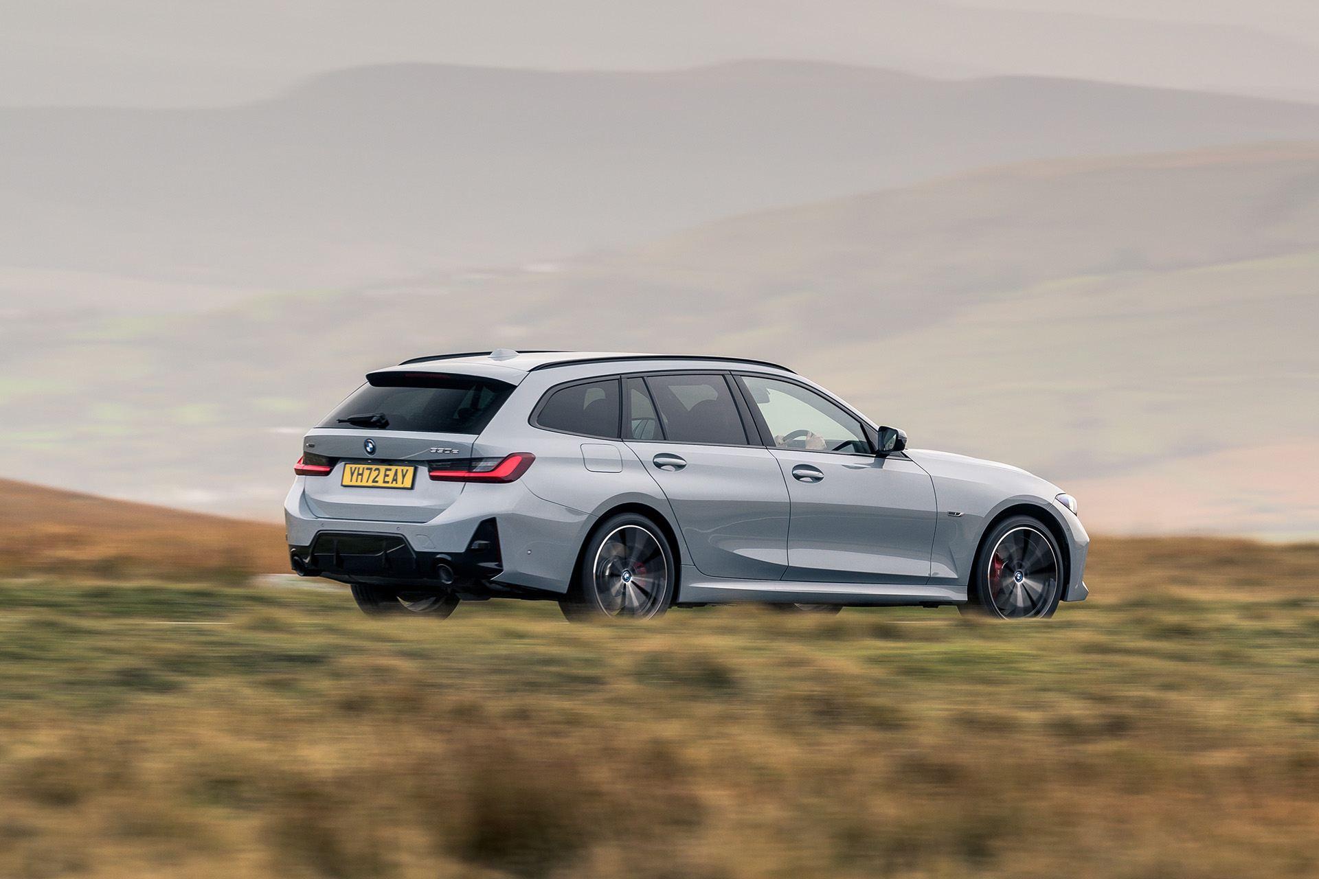 2023 BMW 330e xDrive Touring (UK-Spec) Rear Three-Quarter Wallpapers #14 of 30