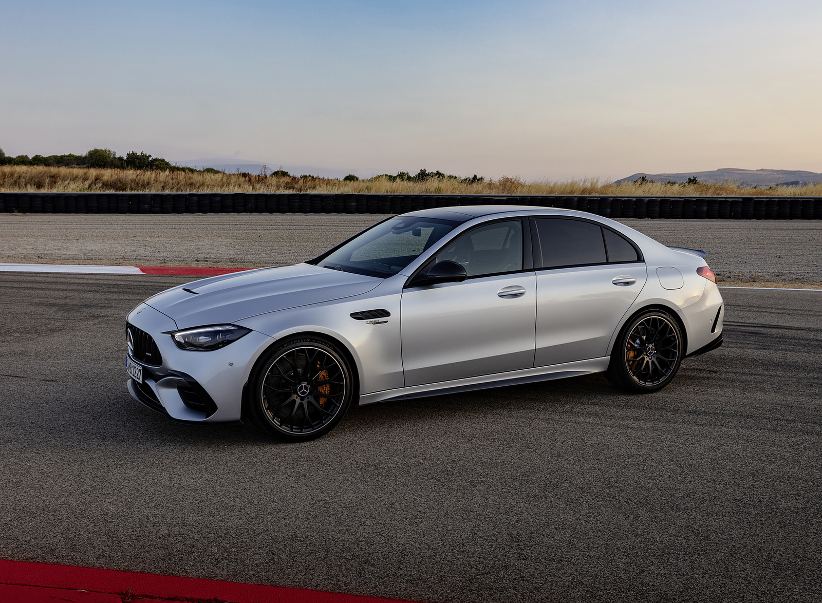 2023 Mercedes-AMG C 63 S E Performance Sedan (Color: High Tech Silver) Front Three-Quarter Wallpapers #13 of 28