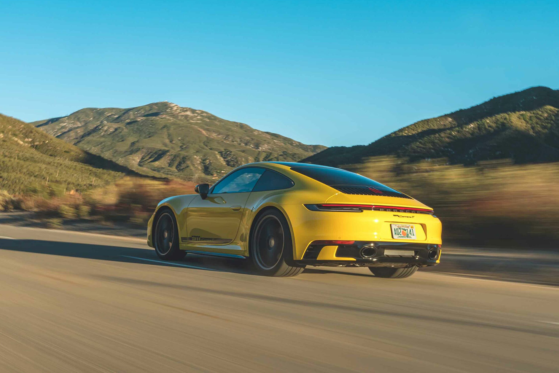 2023 Porsche 911 Carrera T (Color: Racing Yellow) Rear Three-Quarter Wallpapers #41 of 192