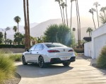 2023 BMW 760i xDrive (Color: Mineral White Metallic; US-Spec) Rear Three-Quarter Wallpapers 150x120