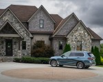 2023 BMW X7 xDrive 40i (Color: Blue Ridge Mountain; US-Spec) Rear Three-Quarter Wallpapers 150x120