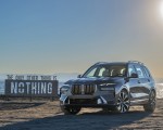 2023 BMW X7 xDrive 40i (Color: Sparkling Copper Grey; US-Spec) Front Three-Quarter Wallpapers 150x120