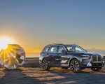 2023 BMW X7 xDrive 40i (Color: Sparkling Copper Grey; US-Spec) Front Three-Quarter Wallpapers 150x120