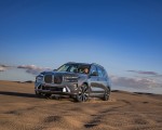 2023 BMW X7 xDrive 40i (Color: Sparkling Copper Grey; US-Spec) Front Three-Quarter Wallpapers 150x120