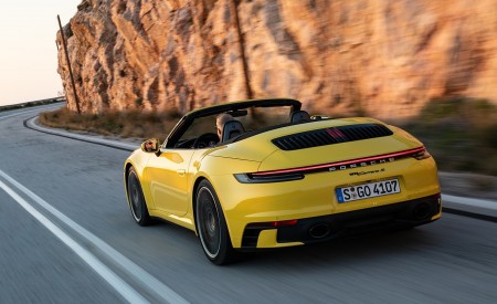 2020 Porsche 911 Carrera S Cabriolet (Color: Racing Yellow) Rear Three-Quarter Wallpapers 450x275 (146)