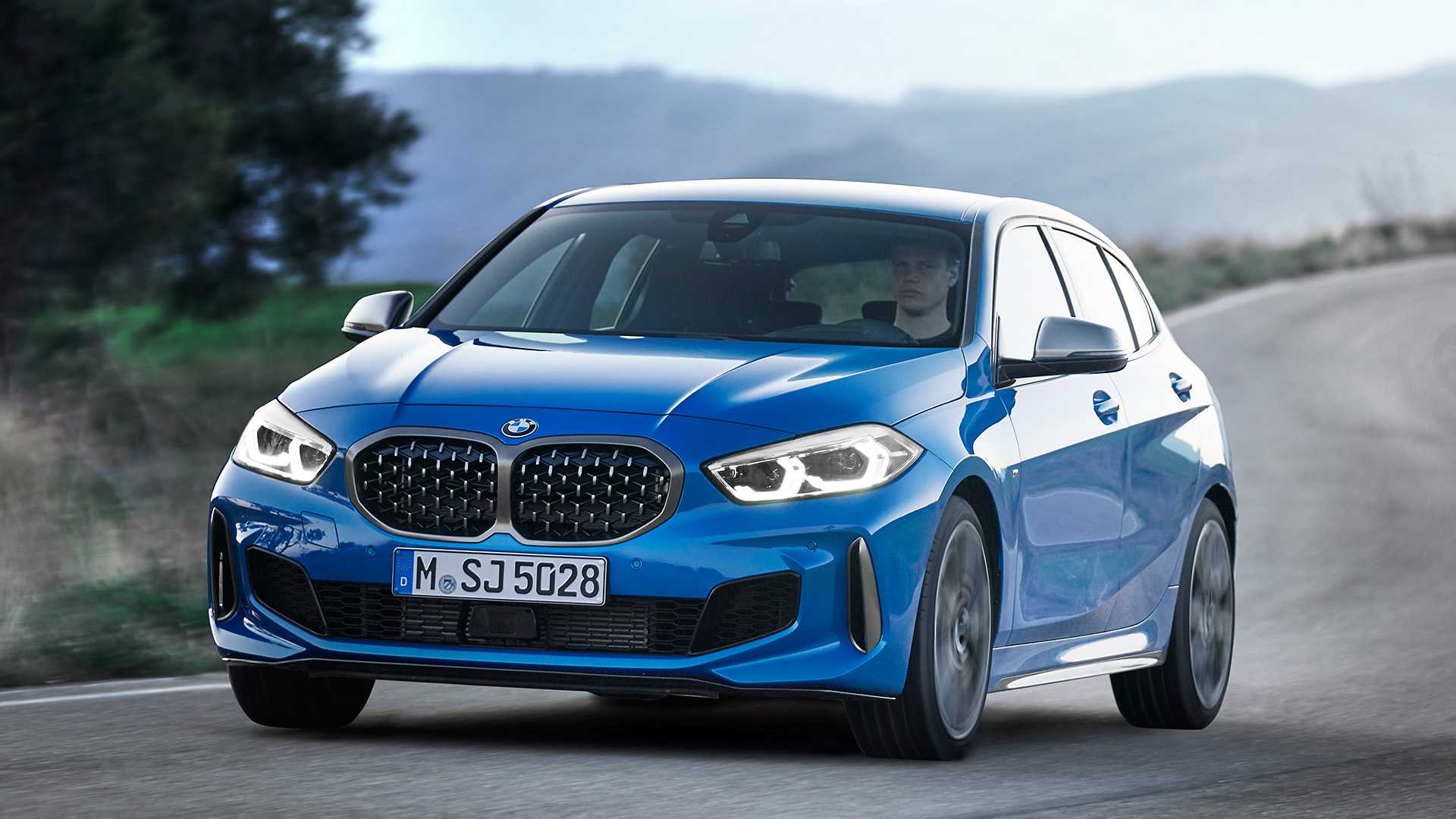 2020 BMW M135i xDrive (Color: Misano Blue Metallic) Front Three-Quarter Wallpapers (3)