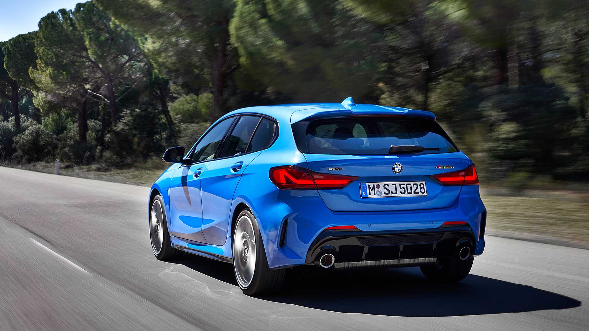 2020 BMW M135i xDrive (Color: Misano Blue Metallic) Rear Three-Quarter Wallpapers (7)