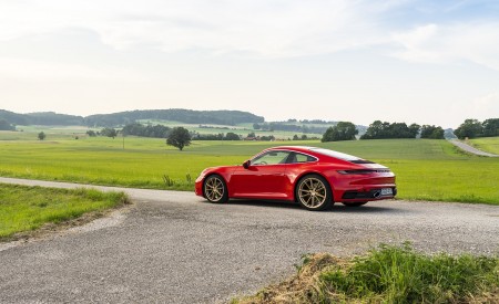 2020 Porsche 911 Carrera Coupe (Color: Guards Red) Rear Three-Quarter Wallpapers 450x275 (22)