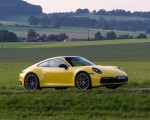 2020 Porsche 911 Carrera Coupe (Color: Racing Yellow) Front Three-Quarter Wallpapers 150x120
