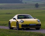 2020 Porsche 911 Carrera Coupe (Color: Racing Yellow) Front Three-Quarter Wallpapers 150x120