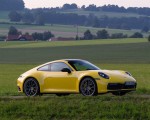 2020 Porsche 911 Carrera Coupe (Color: Racing Yellow) Front Three-Quarter Wallpapers 150x120