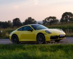 2020 Porsche 911 Carrera Coupe (Color: Racing Yellow) Front Three-Quarter Wallpapers 150x120