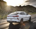 2020 BMW X6 M Competition (Color: Mineral White Metallic; US-Spec) Rear Three-Quarter Wallpapers 150x120