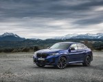2022 BMW X4 M Competition (Color: Marina Bay Blue Metallic) Front Three-Quarter Wallpapers 150x120