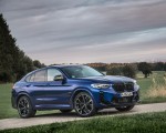 2022 BMW X4 M Competition (Color: Marina Bay Blue Metallic) Front Three-Quarter Wallpapers 150x120