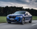 2022 BMW X4 M Competition (Color: Marina Bay Blue Metallic) Front Three-Quarter Wallpapers 150x120