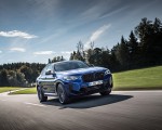 2022 BMW X4 M Competition (Color: Marina Bay Blue Metallic) Front Three-Quarter Wallpapers 150x120