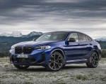 2022 BMW X4 M Competition (Color: Marina Bay Blue Metallic) Front Three-Quarter Wallpapers 150x120