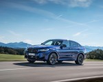 2022 BMW X4 M Competition (Color: Marina Bay Blue Metallic) Front Three-Quarter Wallpapers 150x120